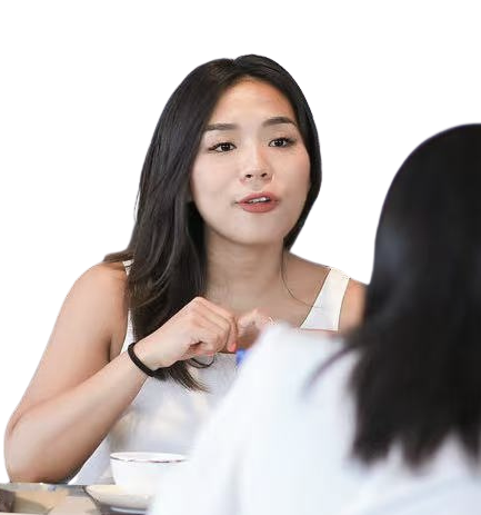 Sisi talking with a client